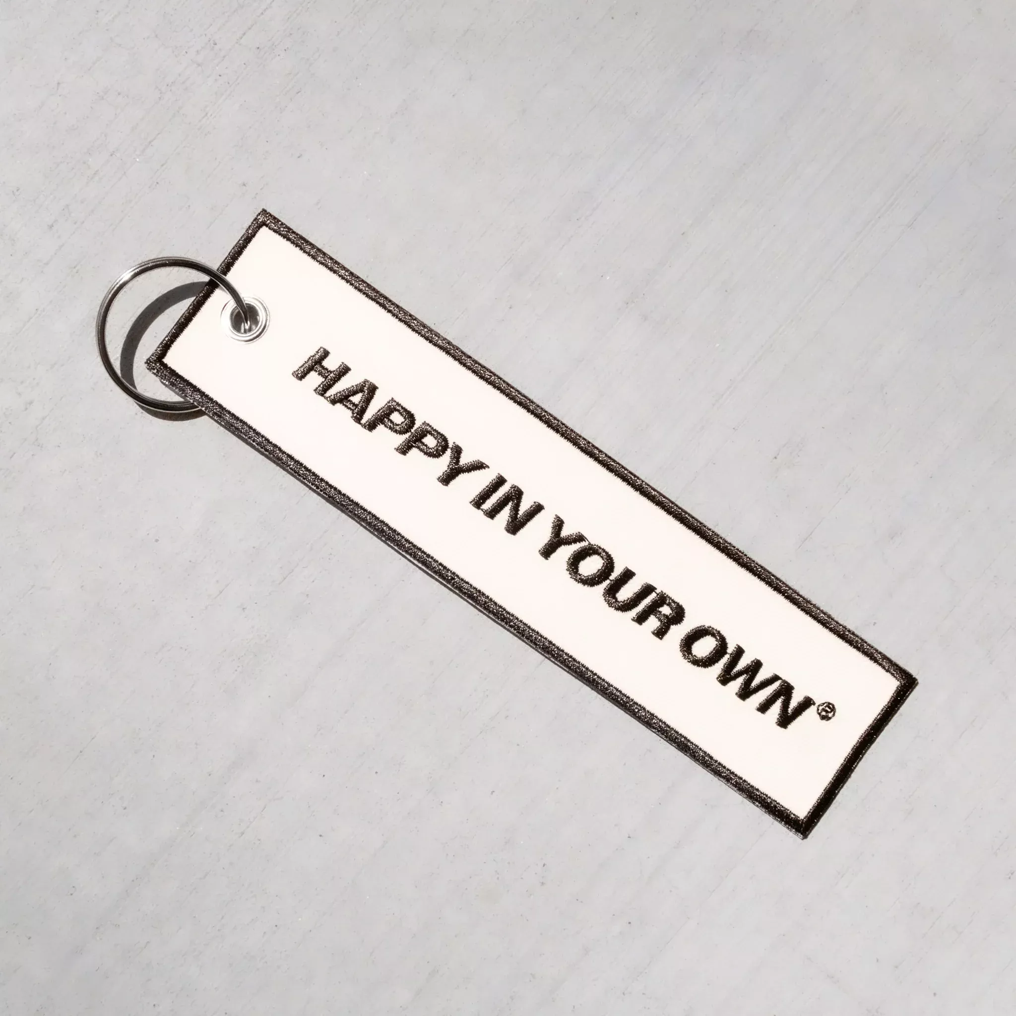 happy in your own keychain